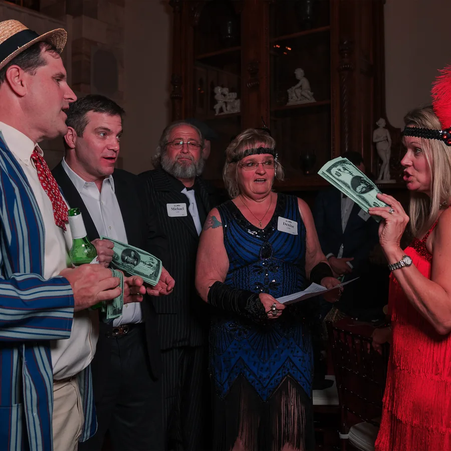 Guests at a Murder Mystery Company public dinner show in Charlotte